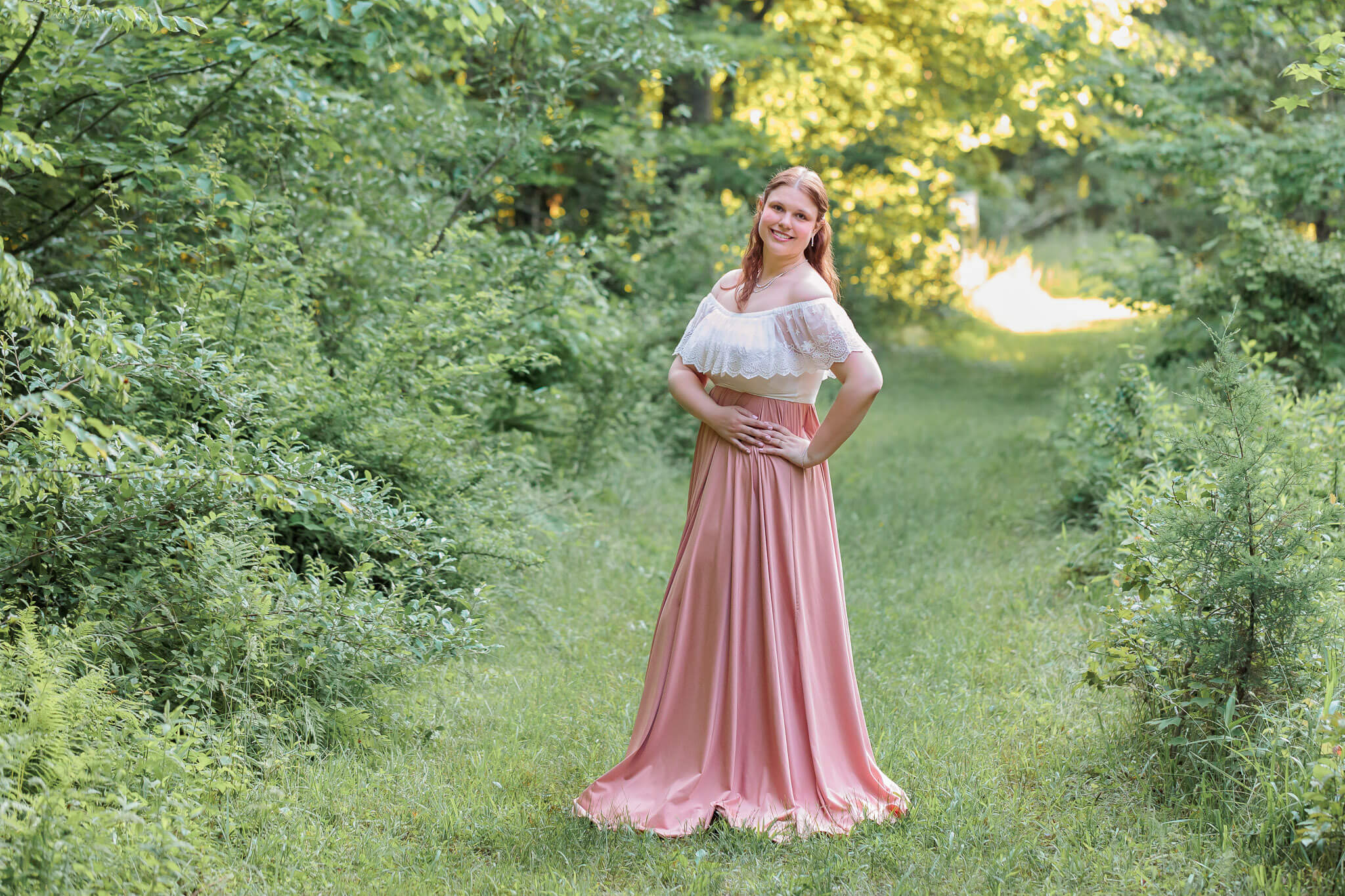 Your Northern Virginia photographer, specializing in maternity sessions, wearing an outfit from her client closet.