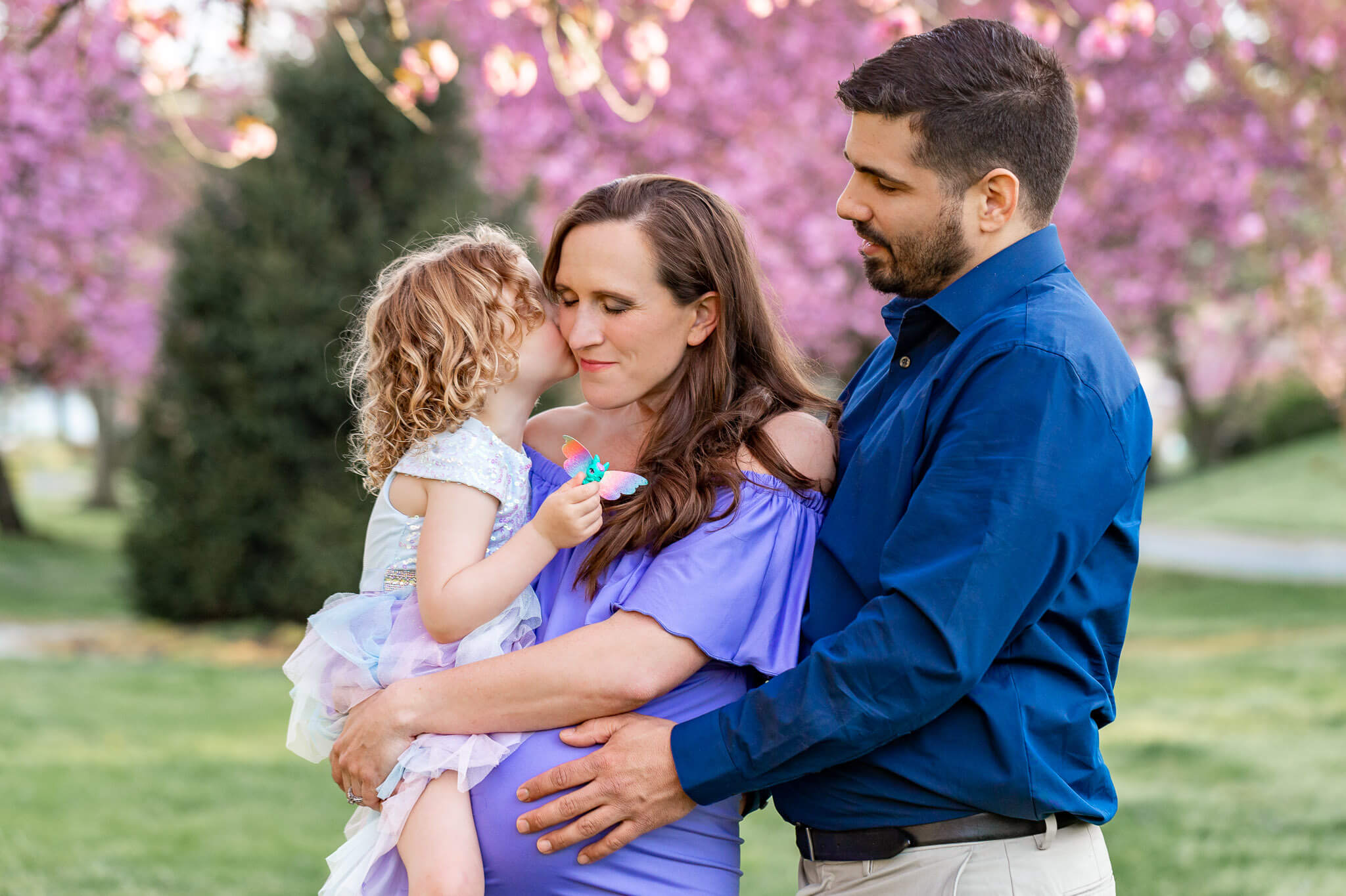 A family with a pregnant mom being featured in a blog about baby stores in Northern Virginia